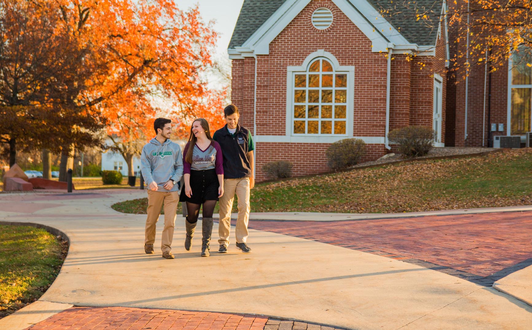 Students walking by Dulany Auditorium