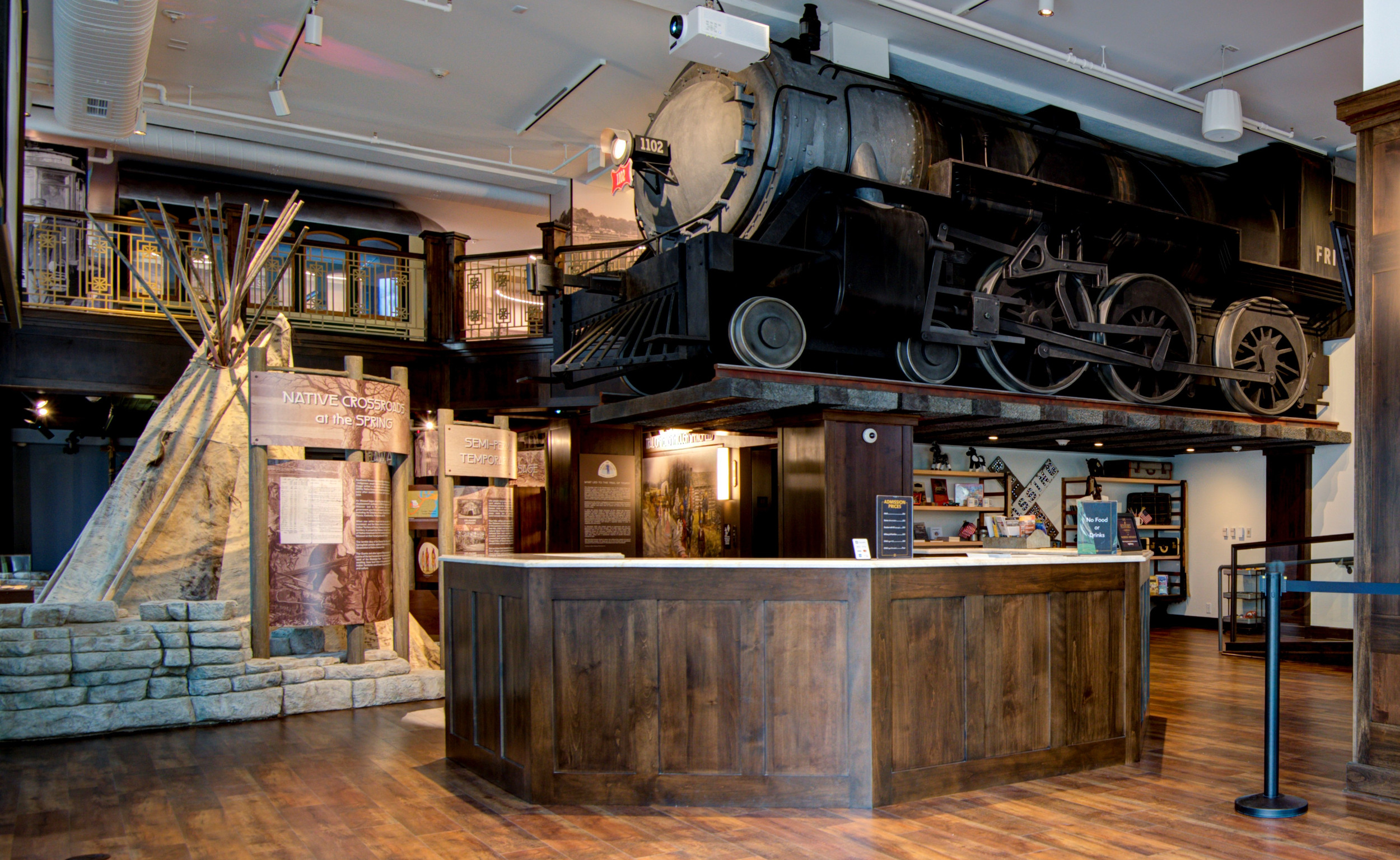 Welcome Center with view of Trains, Trolleys, and Transportation Gallery and Native Crossroads at the Spring Gallery