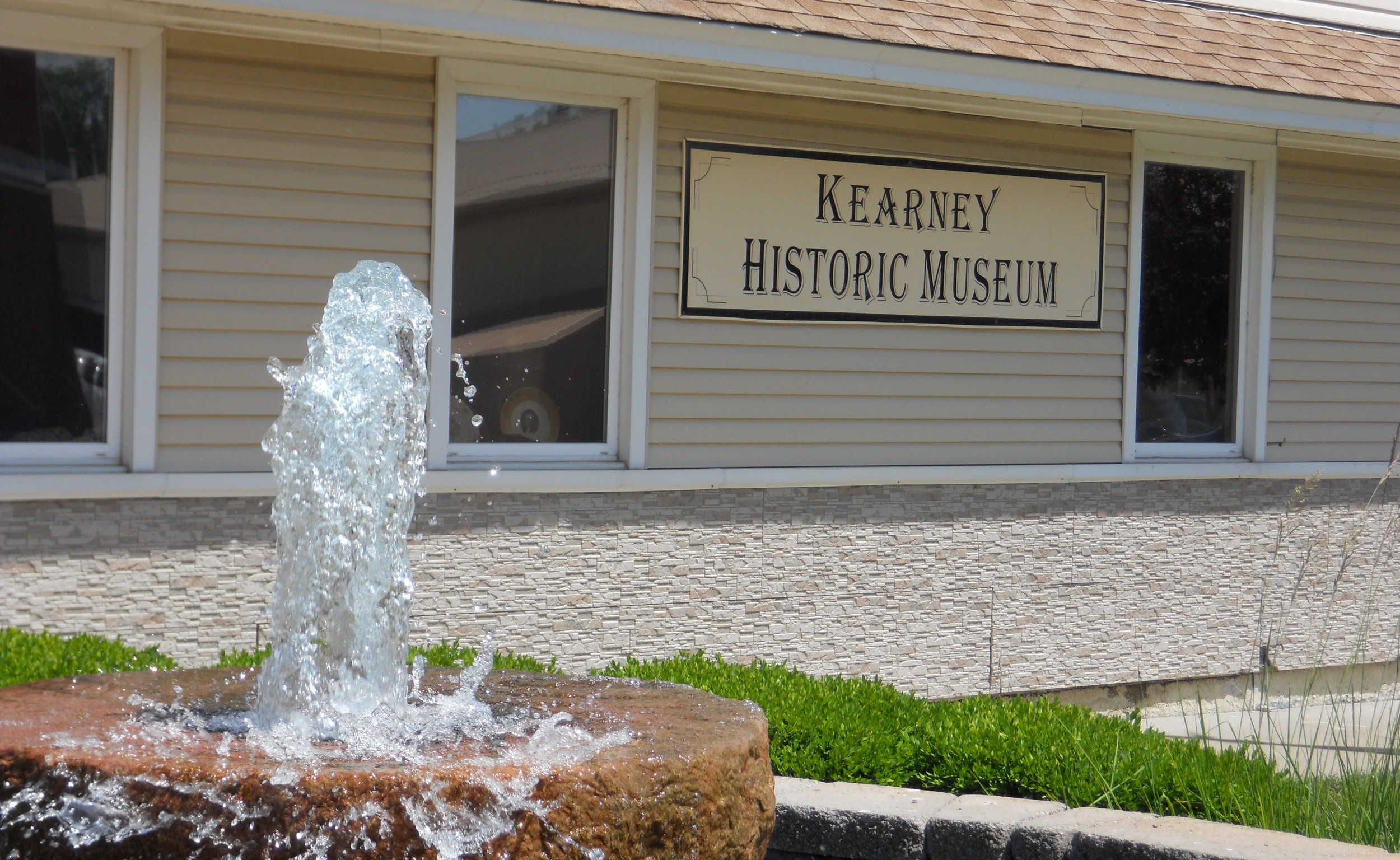 Old mill stone fountain at museum
