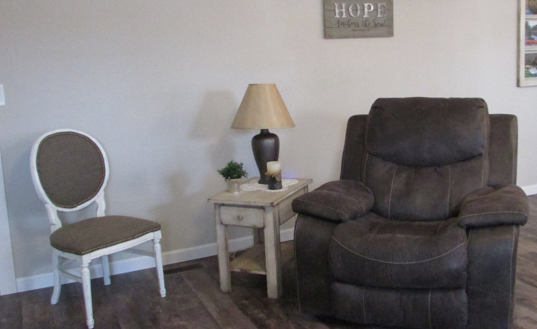 comfy recliner and occasional chair.