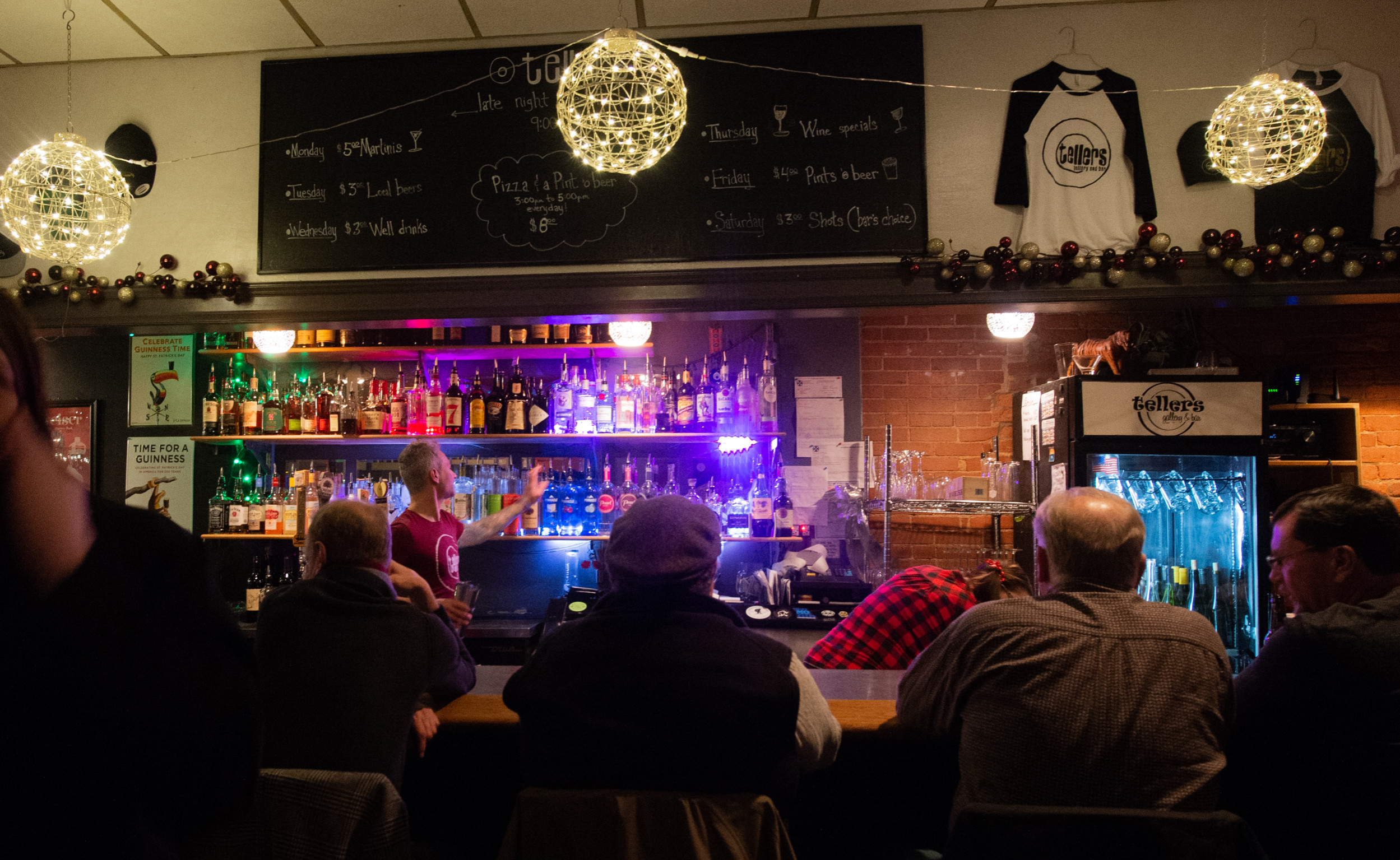 Visitors warm up with dinner and drinks at Tellers after the annual Living Windows Festival the first Friday of every December