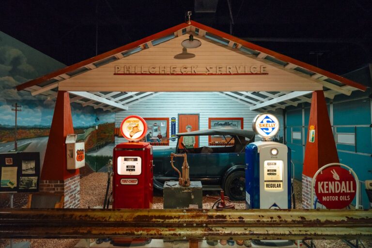 The Route 66 Car Museum shows an old-style gas station with a classic car sitting at the gas pump.