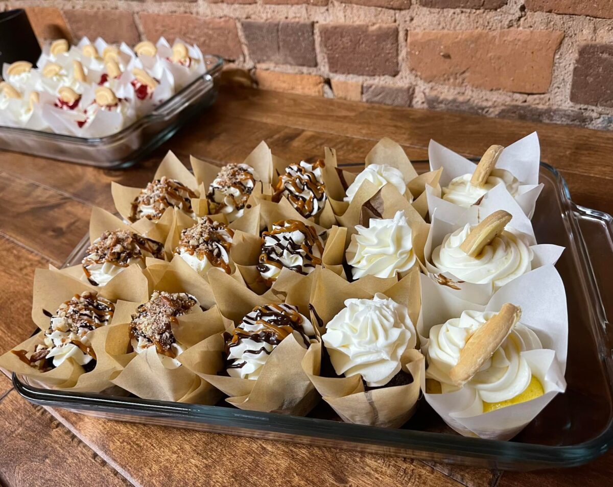 Baked goods wrapped on a sheet pan.