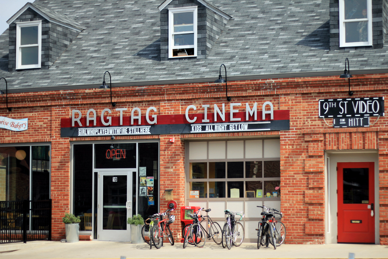 The facade of Ragtag Cinema and 9th St. Video with bikes parked out front.