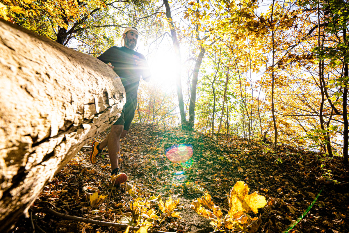 A runner on a path outdoors.