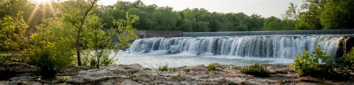 A wide view of a waterfall.