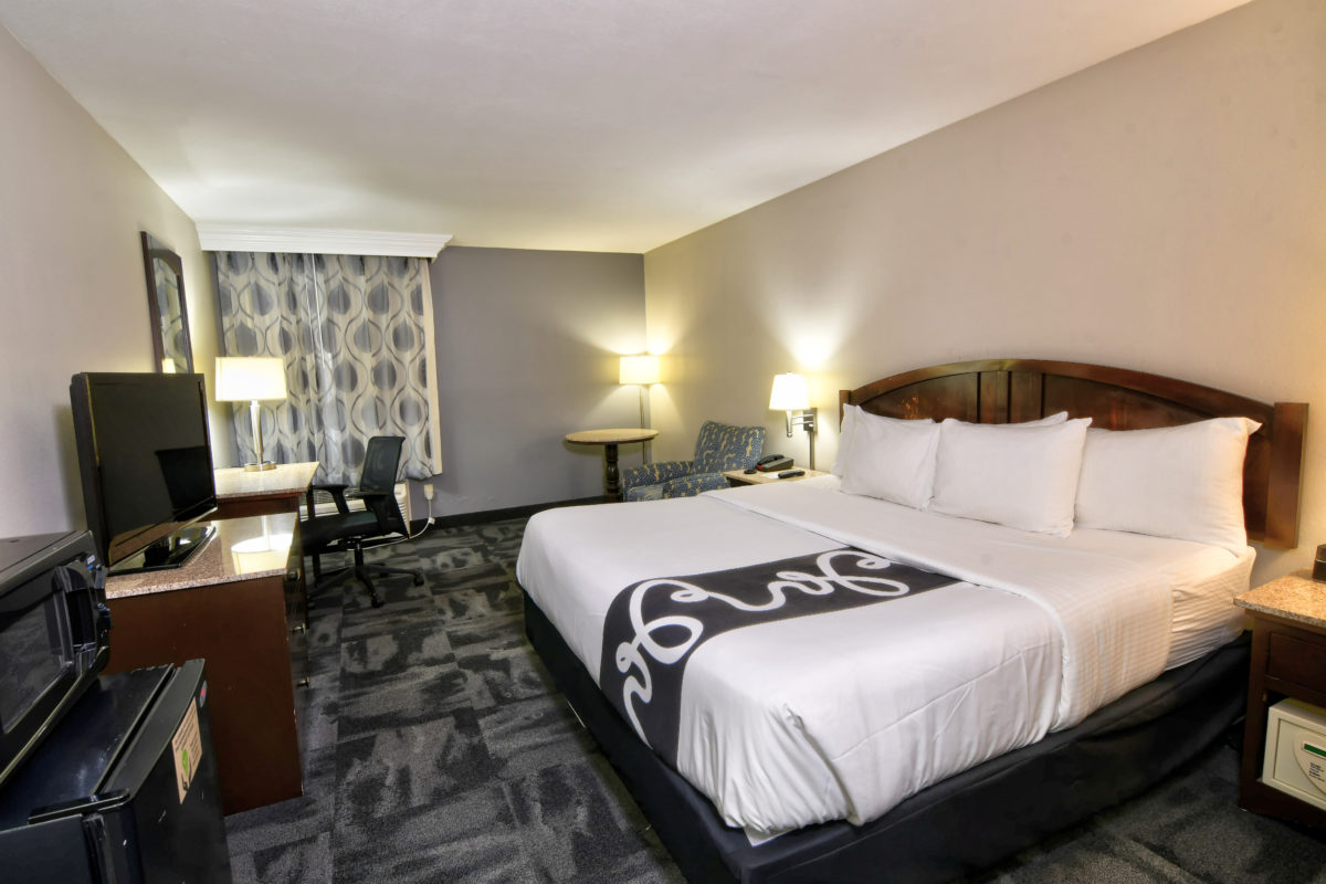A king-sized room in an inn.