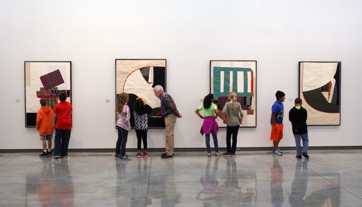 Docent Jim Shoemaker leads a Daum Escape tour