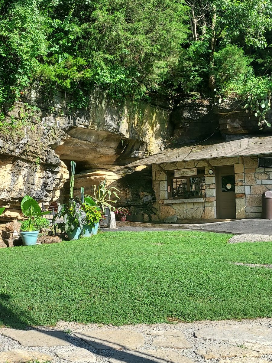 A rock formation and building.