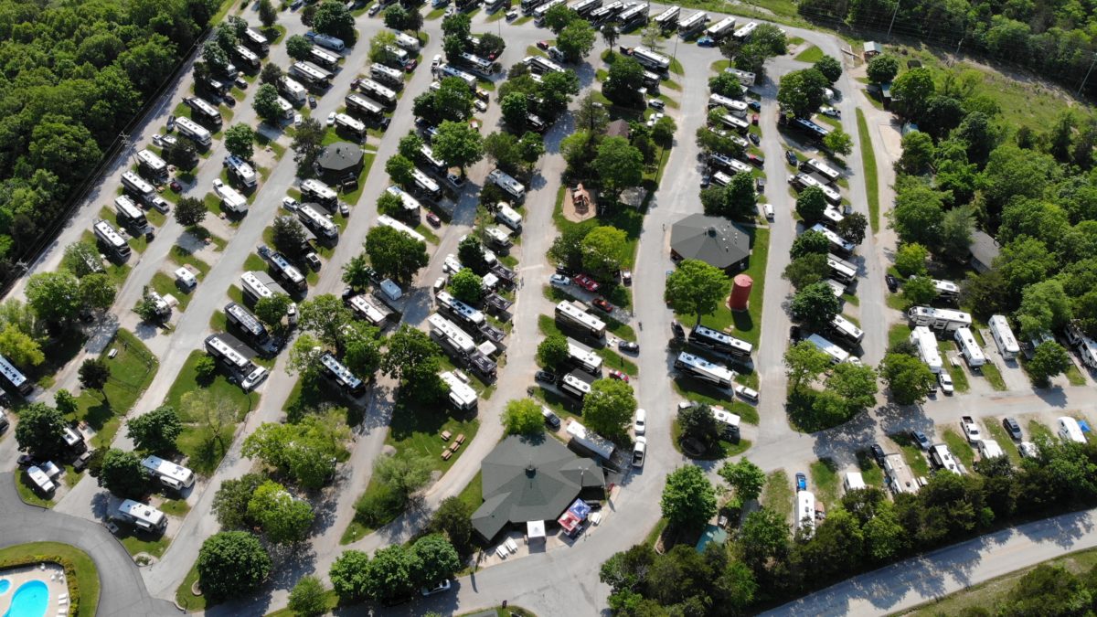 An overhead view of a campground and parked vehicles.