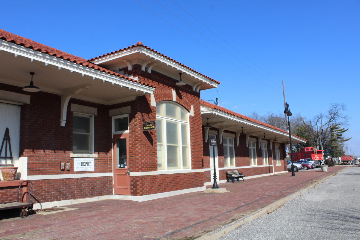 The exterior of a brick depot museum.