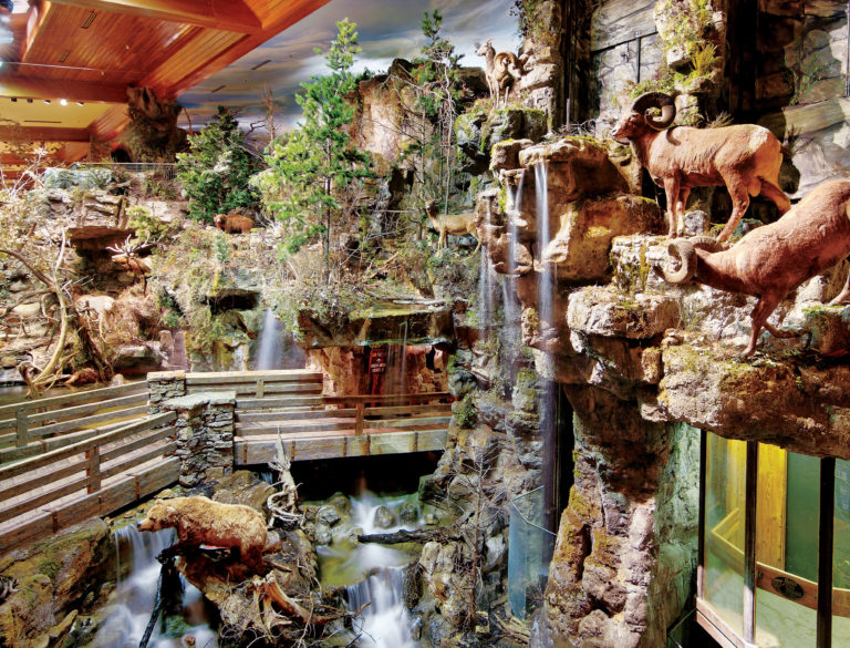 Waterfall and rock formations inside Bass Pro Shops Outdoor World.