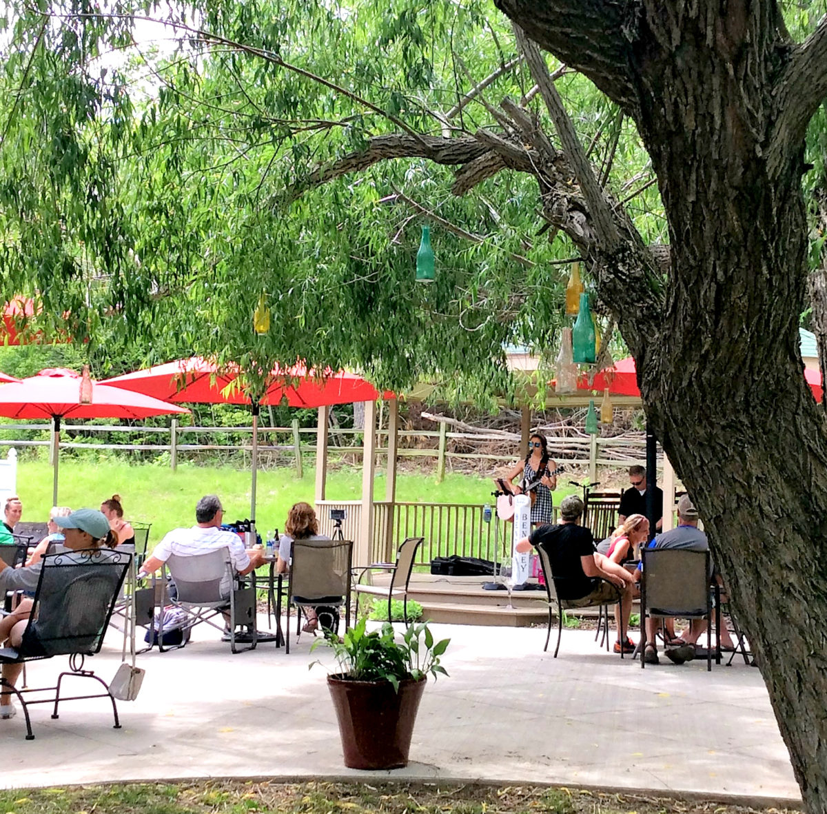 Trees and amenities in a campground.