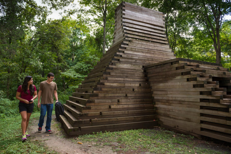 Jackie Ferrara, Laumeier Project, 1981. Made of red cedar, zinc-coated carriage bolts, 187 x 228 x 261 inches.