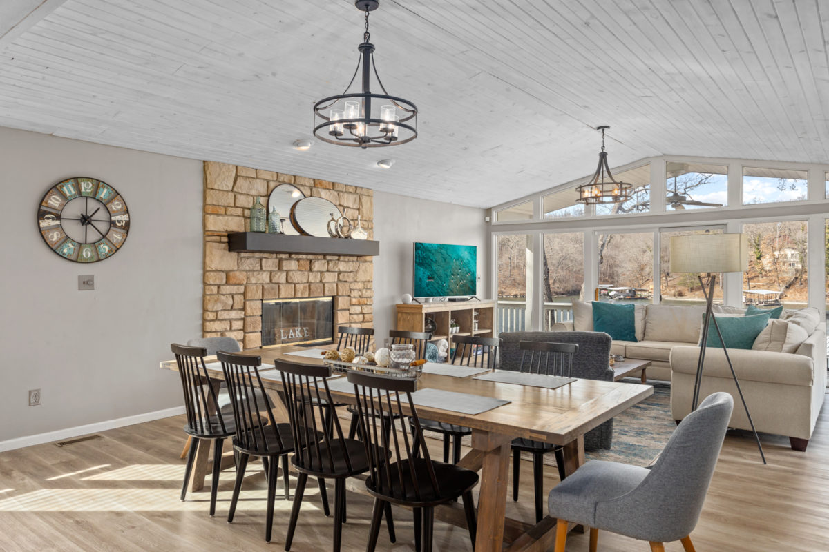 A dining room with wood and blue accents.