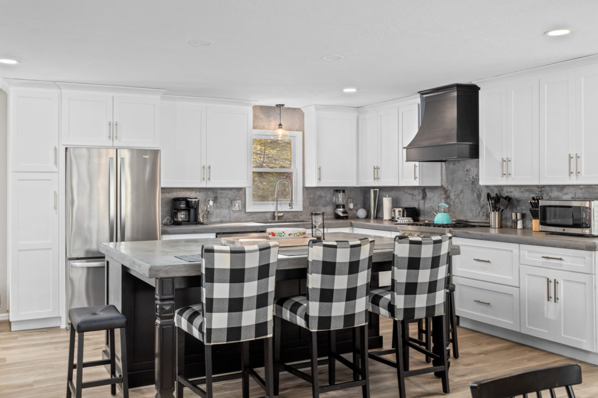 A kitchen with wood and blue accents.