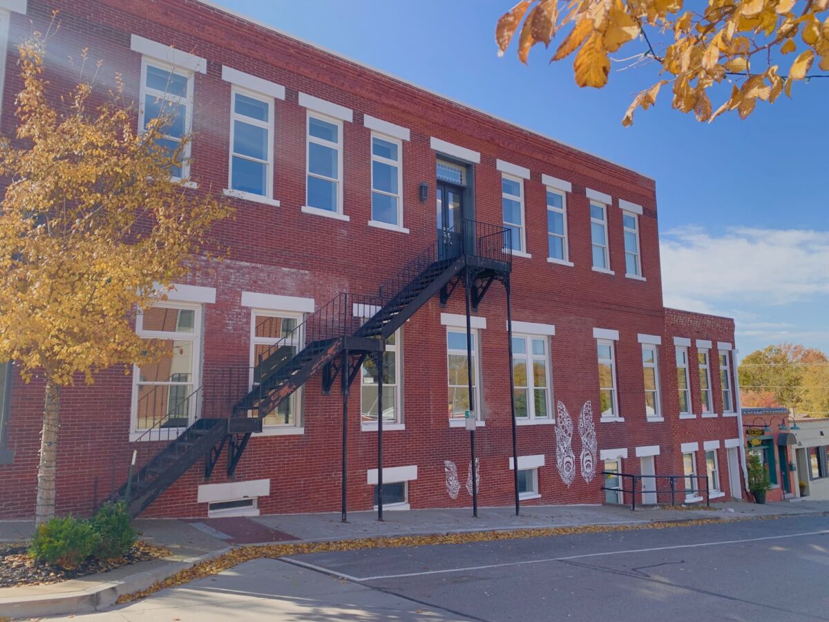 The outside of a red brick building.
