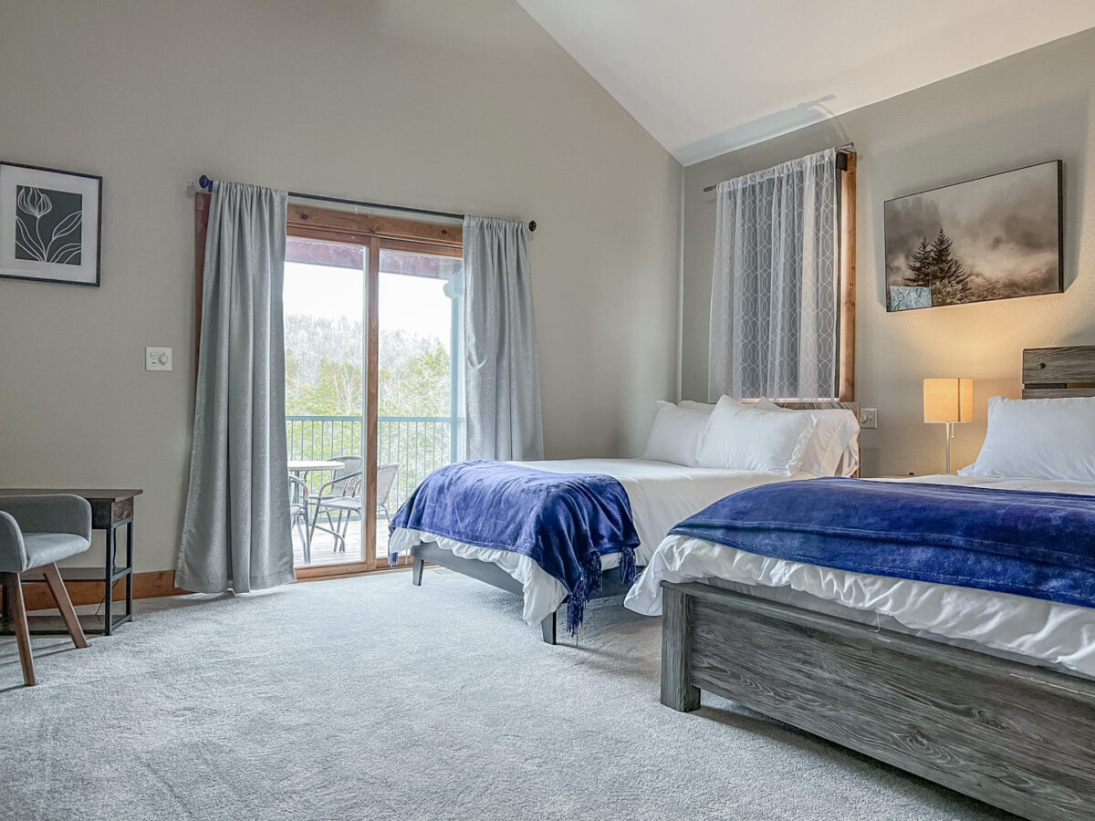 A two-bedroom space in a large vacation home.
