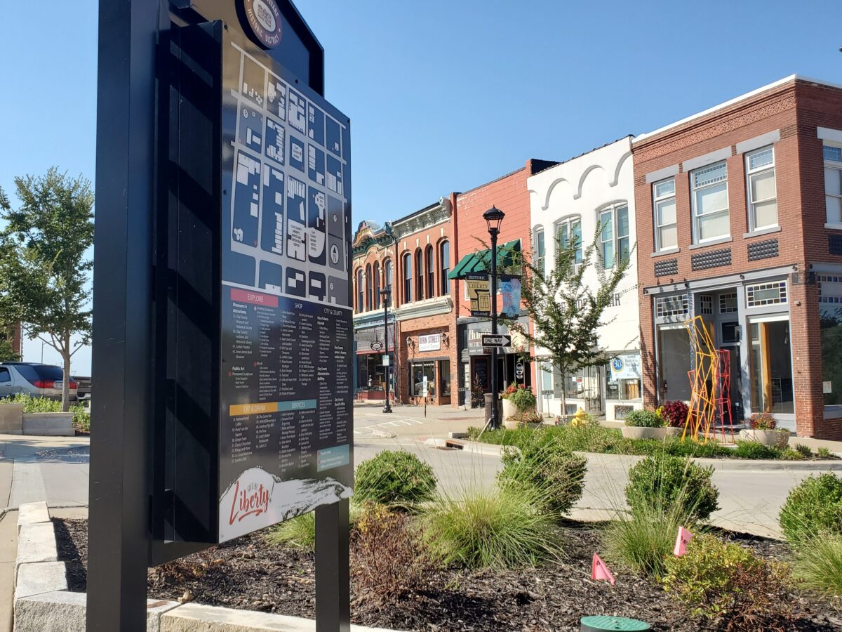 An outdoor sign for the Liberty Square Historic District.