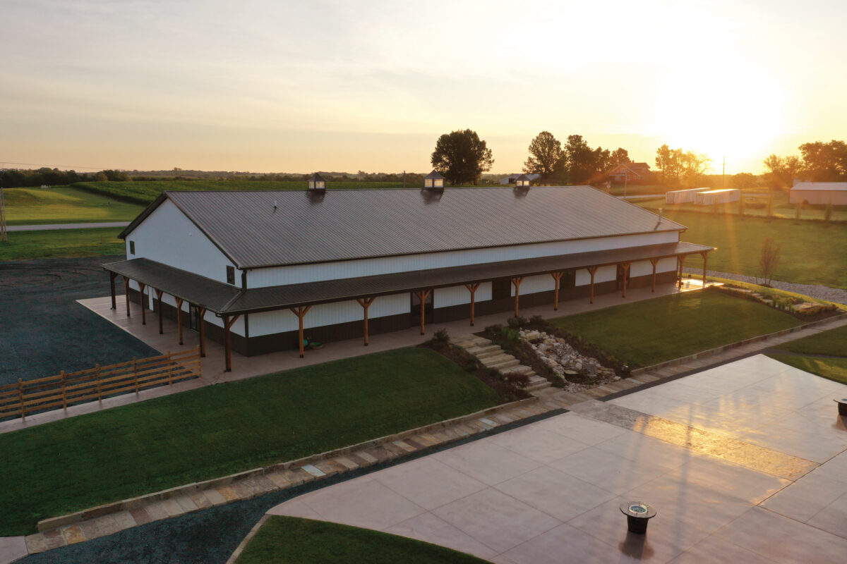 Aerial view of The VeNue Event Space overlooking the concrete pad and water feature behind the VeNue Event Space