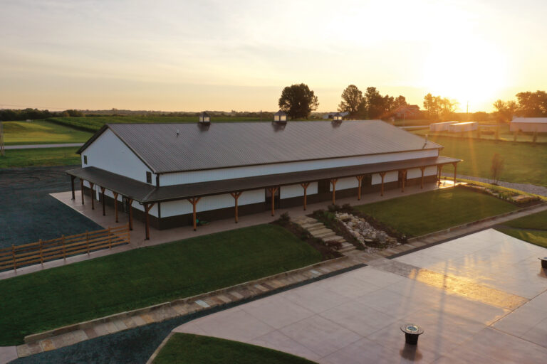 Aerial view of The VeNue Event Space overlooking the concrete pad and water feature behind the VeNue Event Space