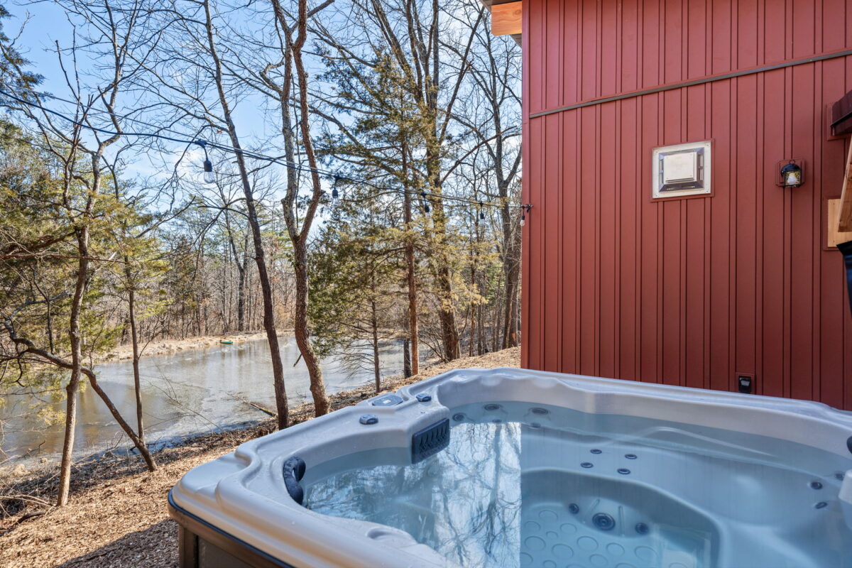 An outside hot tub at a treehouse.