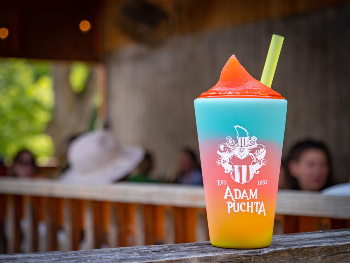 A colorful slush drink in a cup.