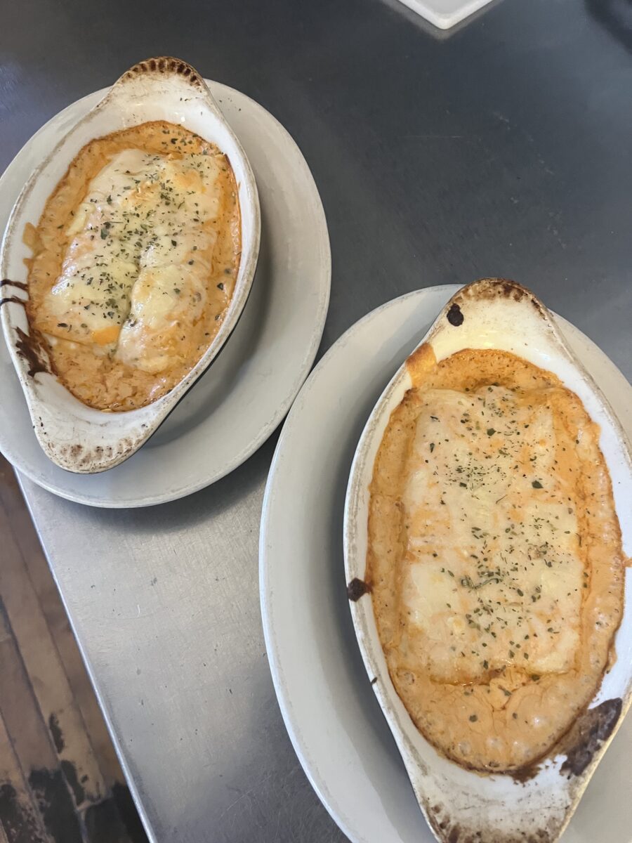 Baked dishes plated on a table.