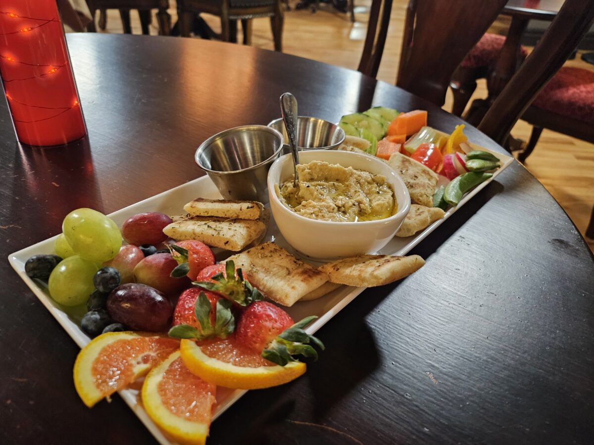 A hummus board on a table.