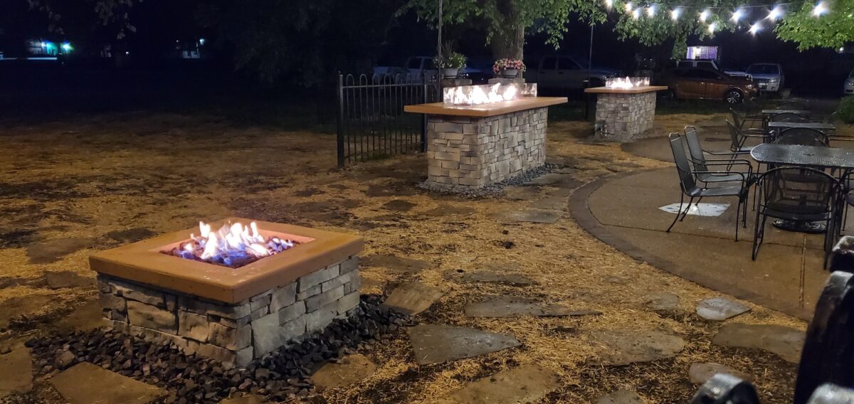 Fire places outside at a winery.