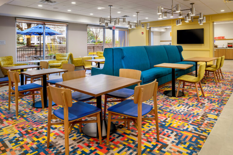 seating area with sofa and tables