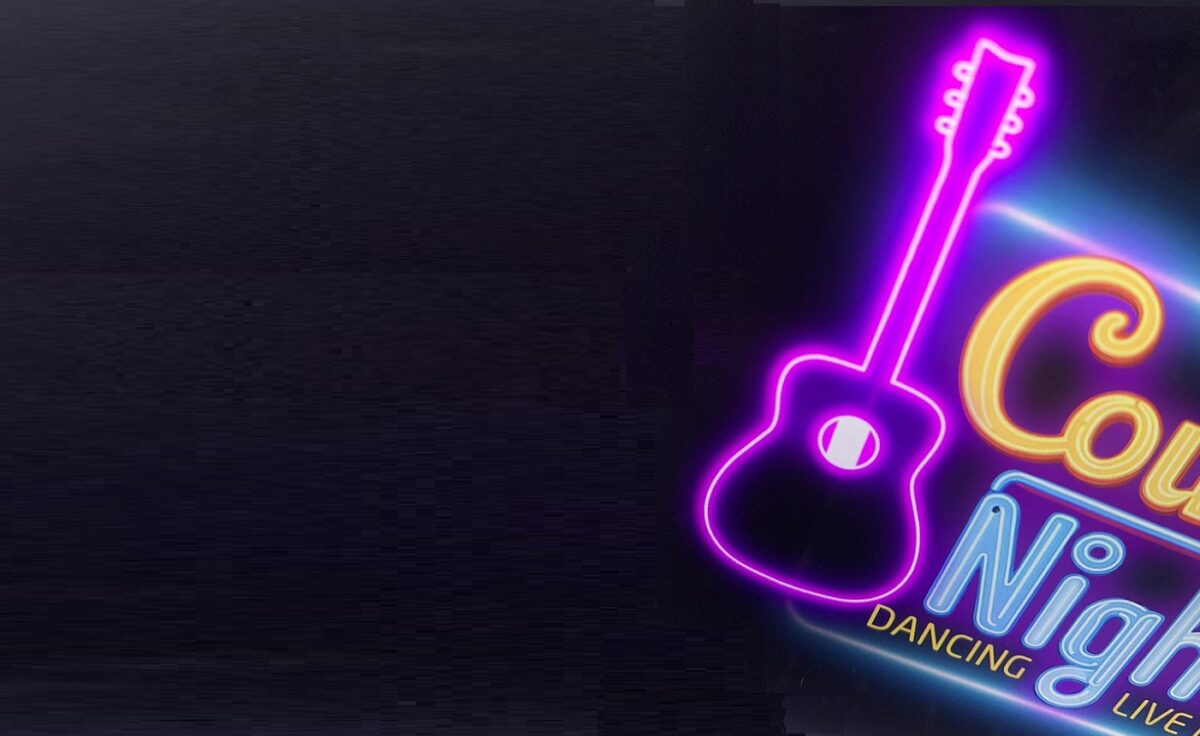 The edge of a lighted banner advertising Country Nights, a dance club with live music.