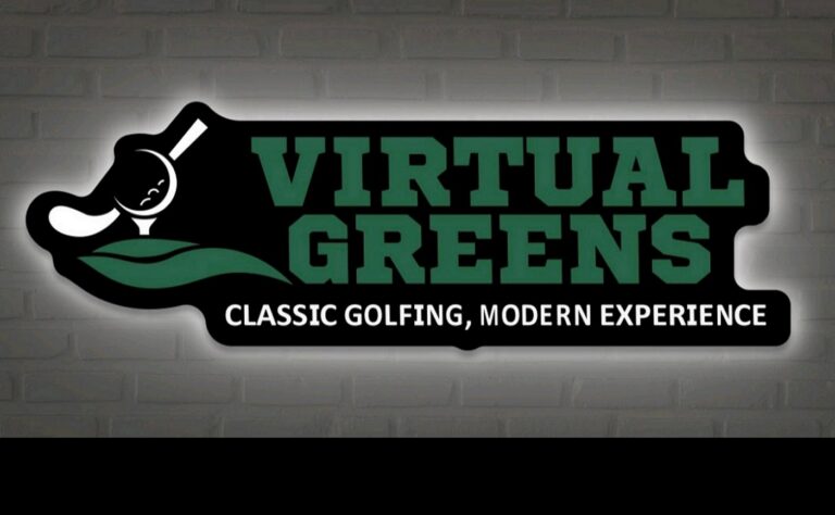 A logo for Virtual Greens, with green text and a graphic of a golf ball on a tee and a club.