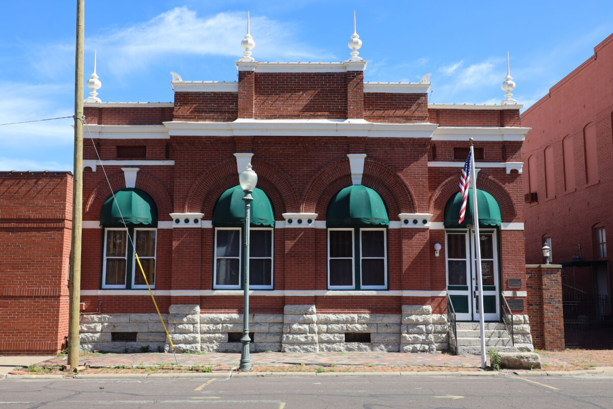 Anheuser-Busch Building with green awnings.