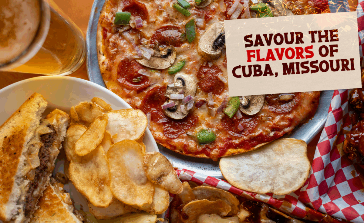 Overhead view of a hearty meal at Frisco’s Grill & Pub featuring a pepperoni pizza with mushrooms and green peppers, a grilled sandwich with sautéed onions, house-made potato chips, and a pint of beer on a wooden table.