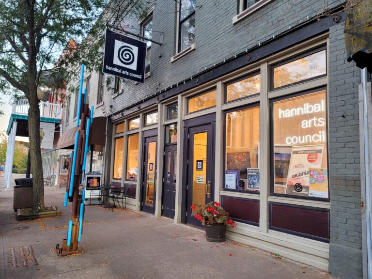 A storefront along a peaceful street.