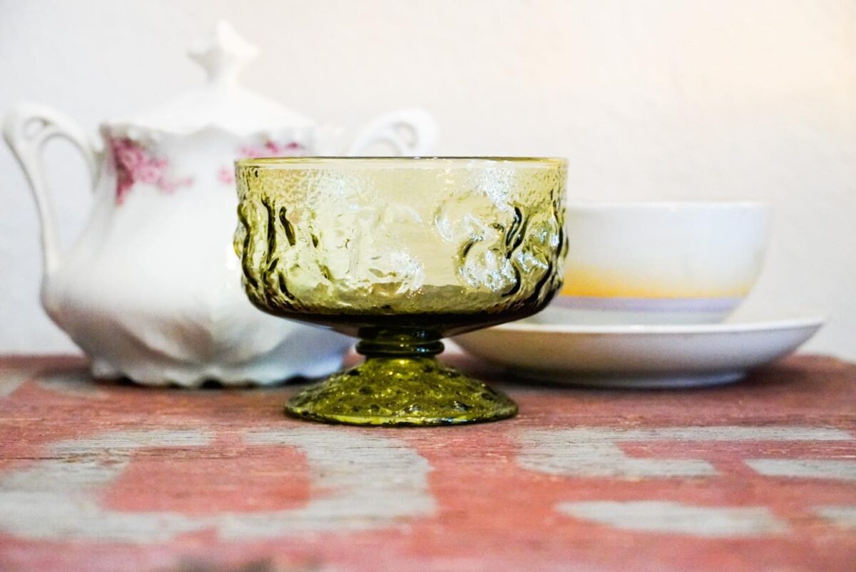Antique items arranged on a table.