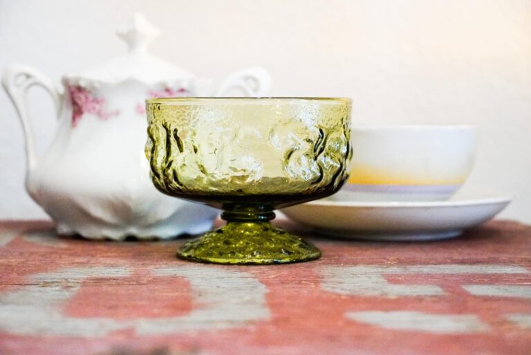 Antique items arranged on a table.