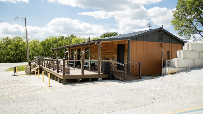 The outside of a rustic building.
