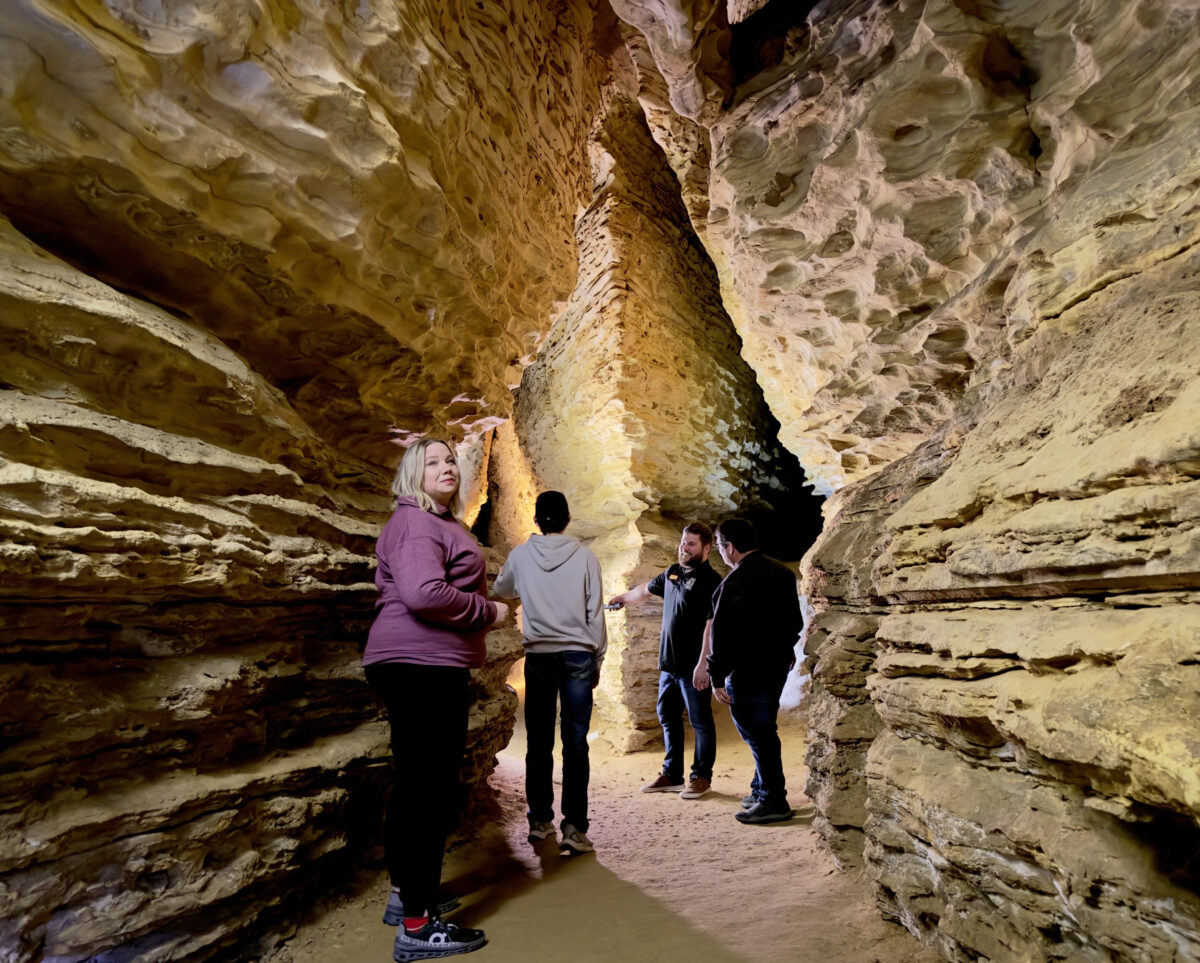People inside a cave.