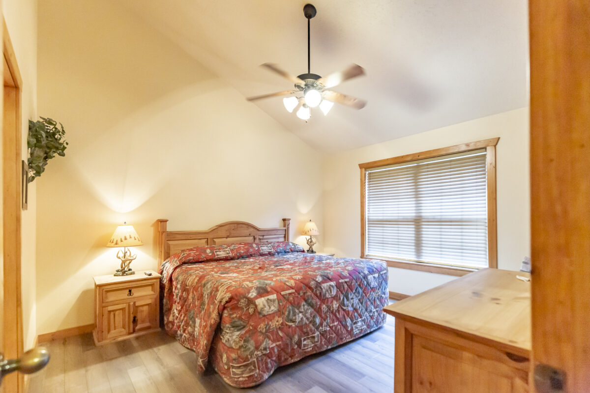 The bedroom of a resort cabin.