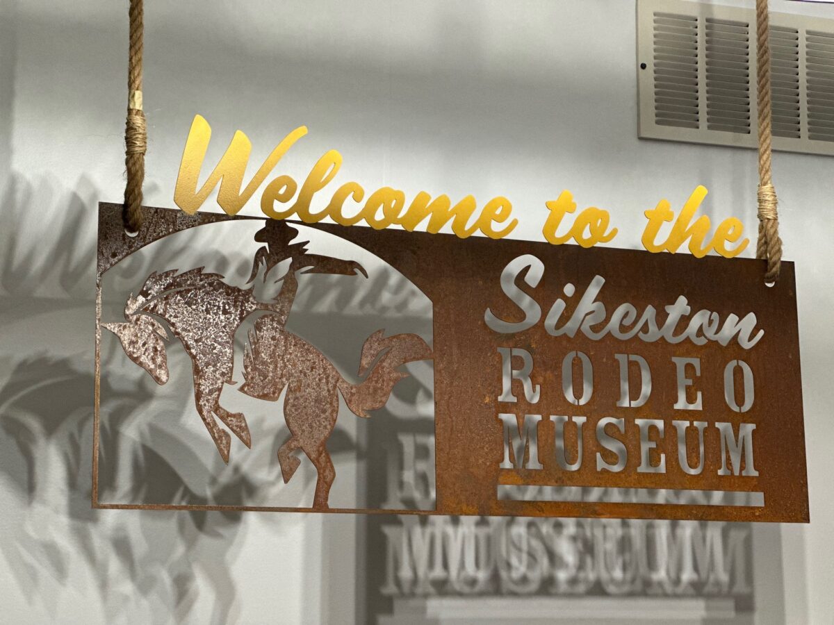 A welcome sign for a rodeo museum.