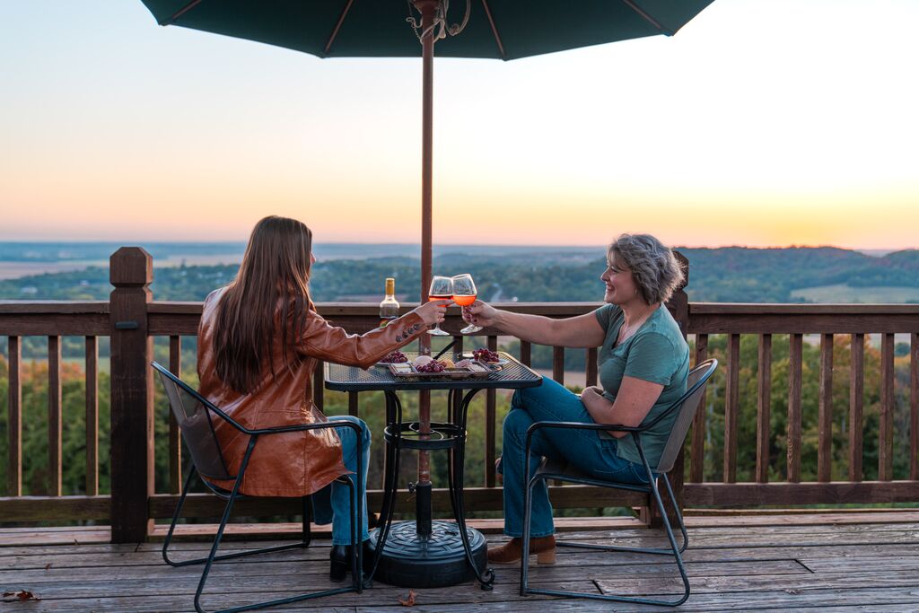 Two women drink wine at a Missouri Winery.