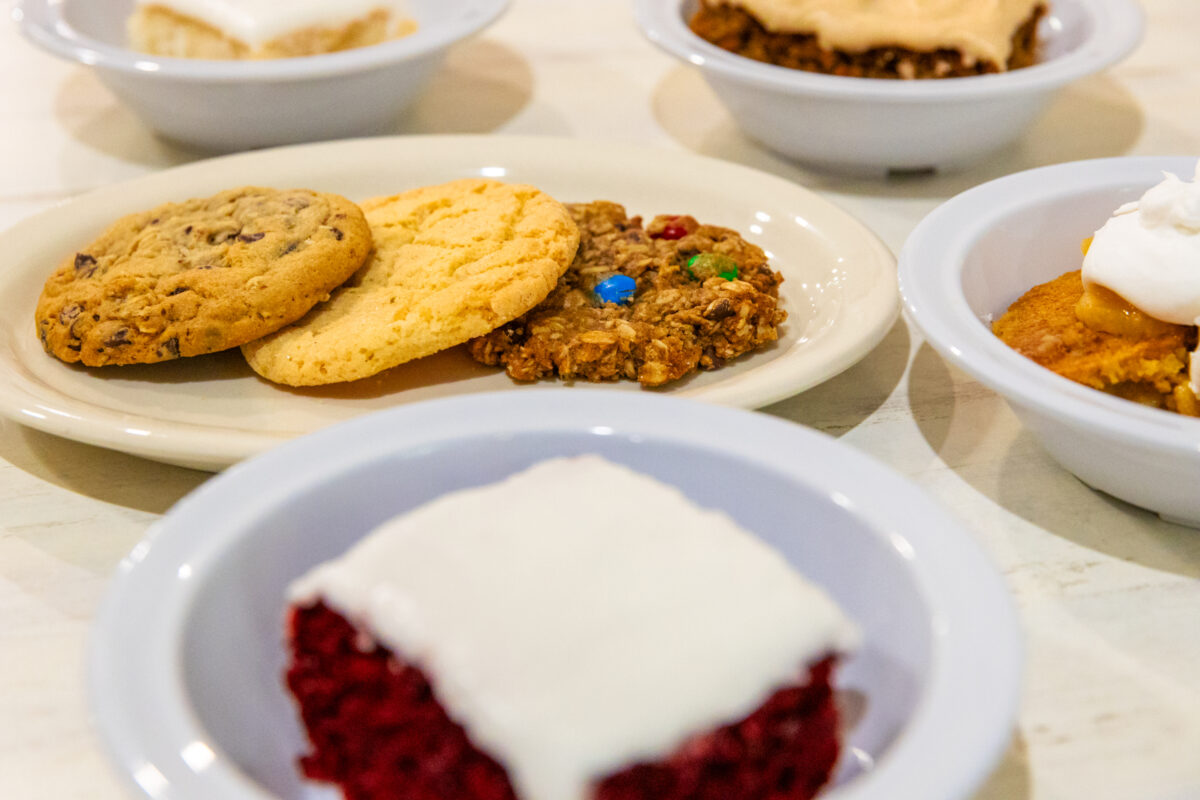 Desserts including red velvet cake and cookies at Pagliai's Pizza.