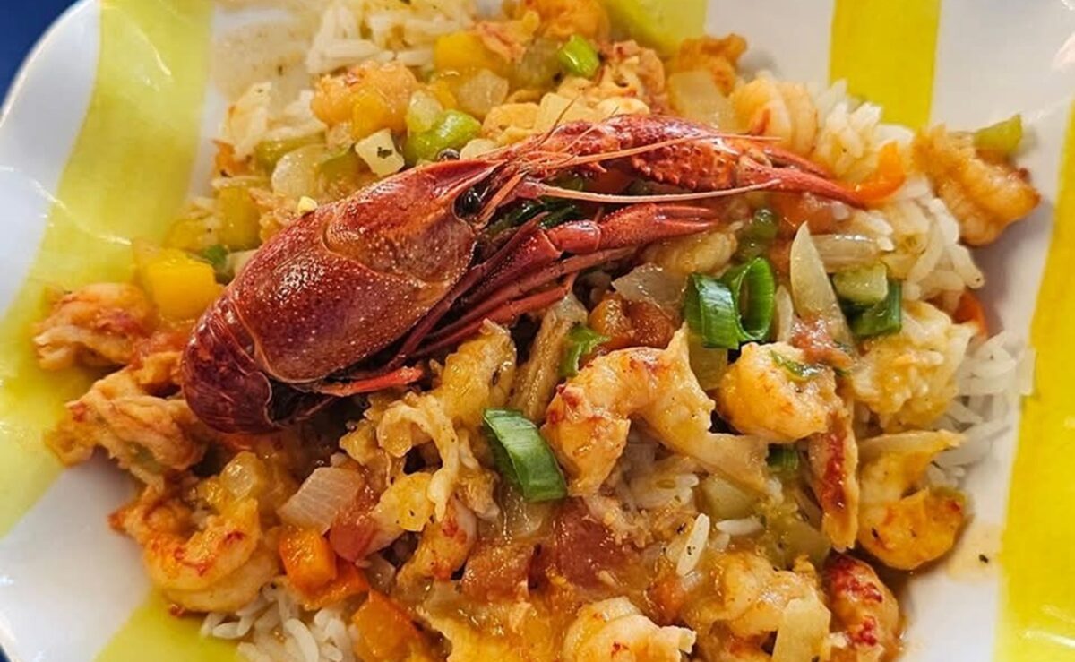 A seafood dish plated with shrimp and other ingredients.