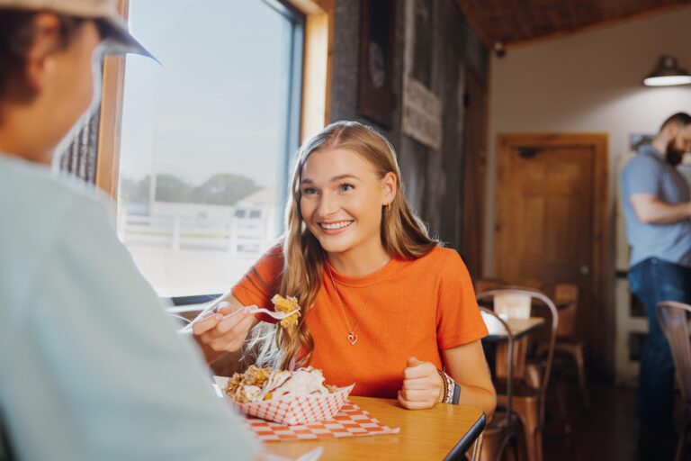 Diners enjoy a meal at Dexter Queen Barbecue.