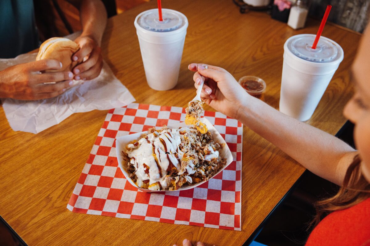 Diners enjoy a meal at Dexter Queen Barbecue.