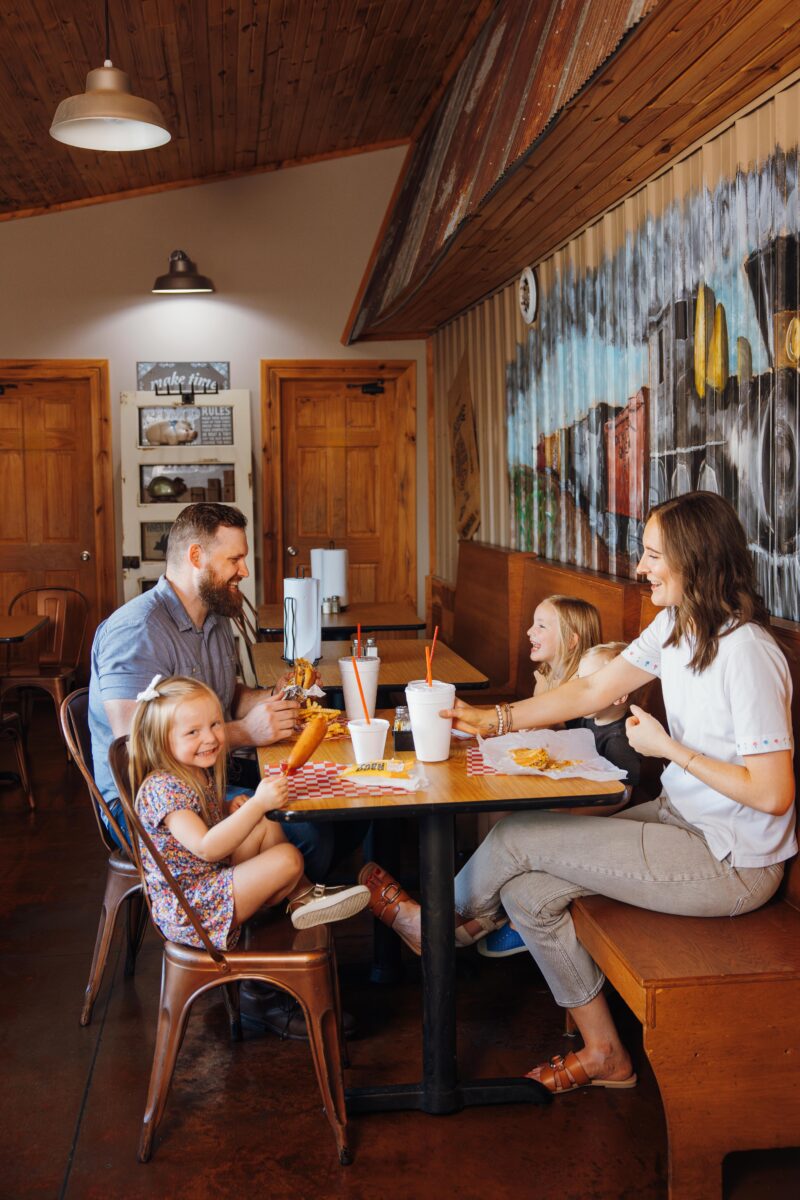 Diners enjoy a meal at Dexter Queen Barbecue.