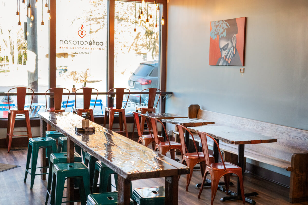 Tables and chairs in a restaurant dining area.