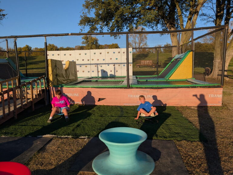 Children play at a trampoline park at River City Adventure Park.